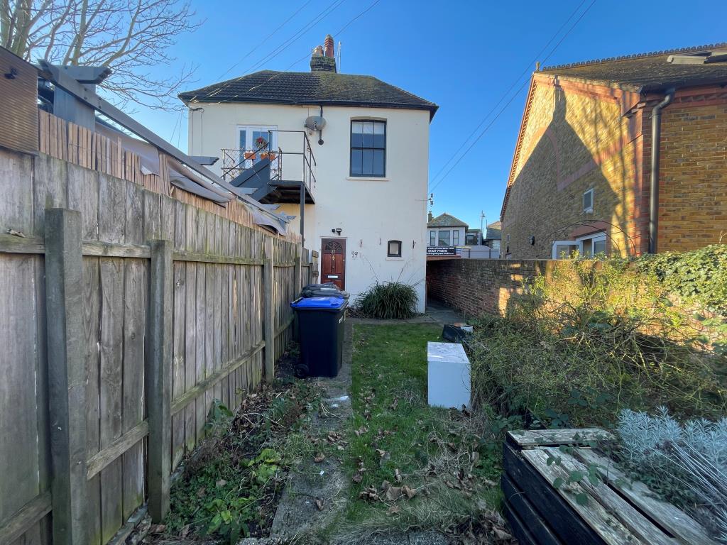 Lot: 138 - MIXED-USE PROPERTY IN HIGH STREET LOCATION - Rear view of end terrace